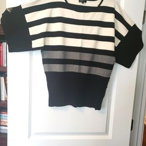 Pull over sweater with a flare